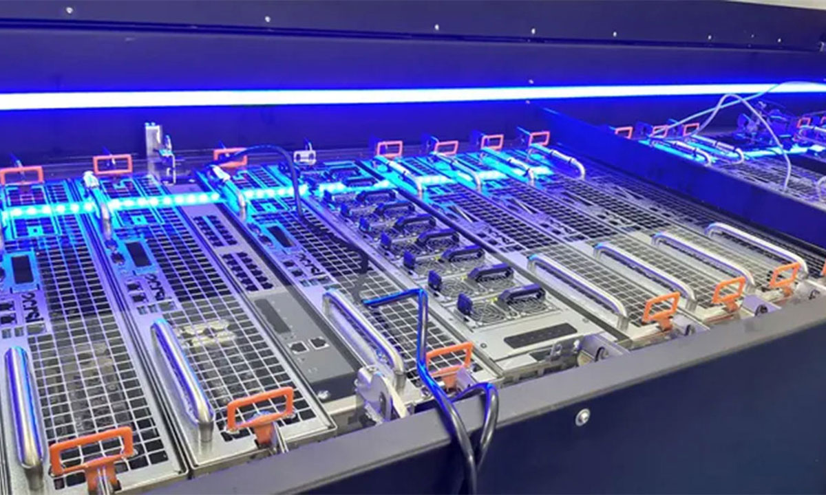 Row of data center servers with liquid cooling