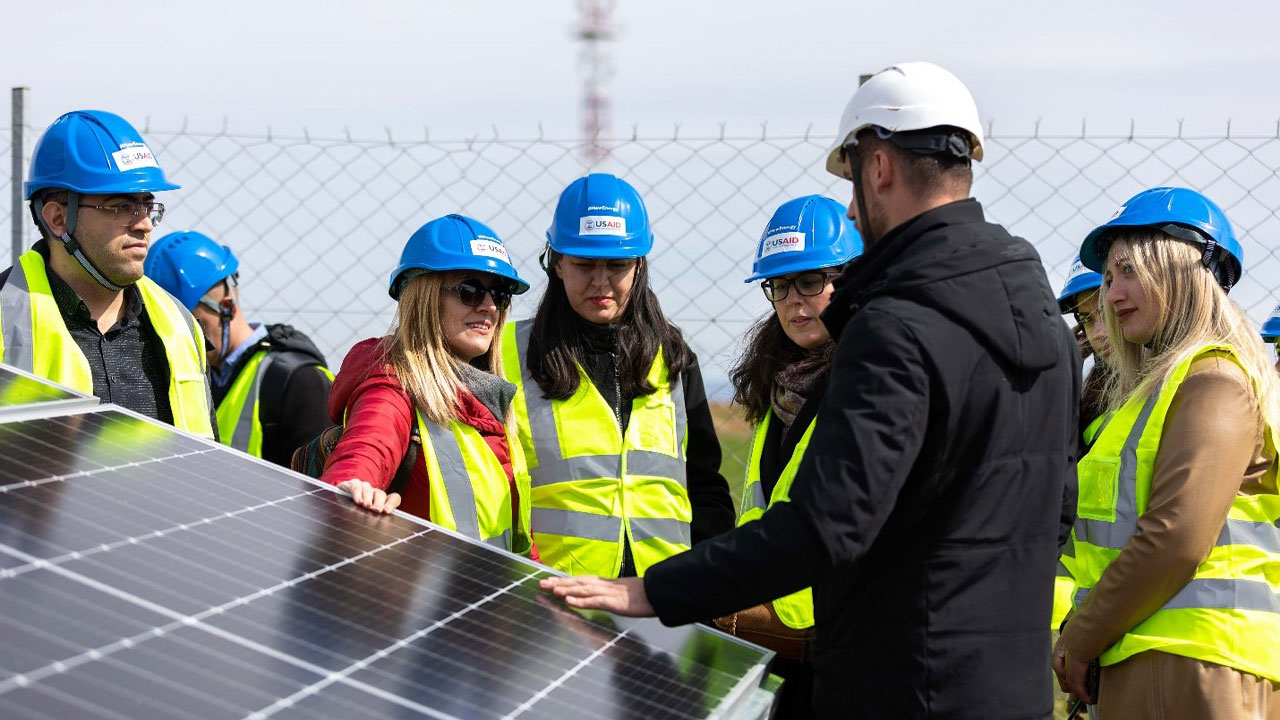 New Energy Internship Program interns and mentors visiting the ProCredit Bank Solar Park