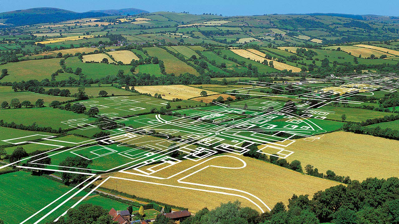 White outline of development plans on rural valley