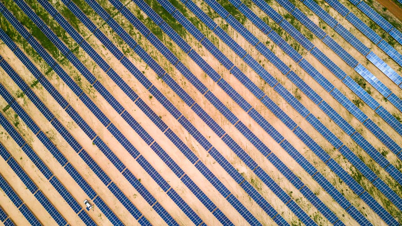 Field of solar panels at the Senergy Solar Power Plant in Senegal