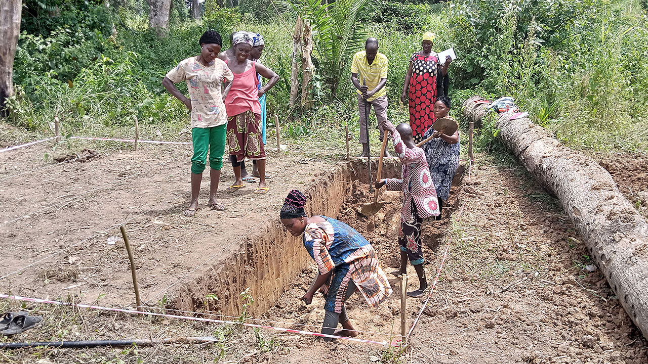 A group of people learn a sustainable mining technique for artisanal miners